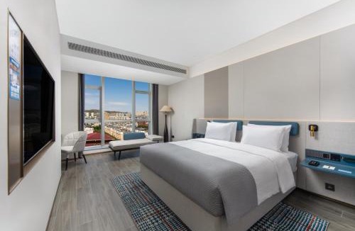 Saybagh District Hotel | Wanda Yuehua Hotel Urumqi Railway