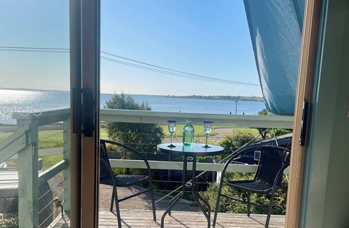 Eagle Point Apartment | Waterfront - Brilliant Sunrise & Moonrise Views from your very comfy Queen Bed.