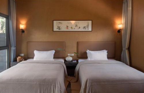 Jinghong Hotel | Xishuangbanna Peacock Valley Hot Spring VILLA Resort