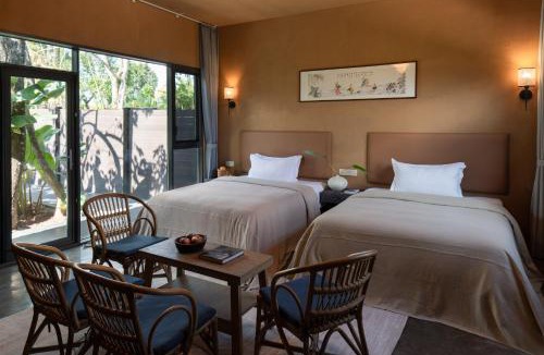 Jinghong Hotel | Xishuangbanna Peacock Valley Hot Spring VILLA Resort