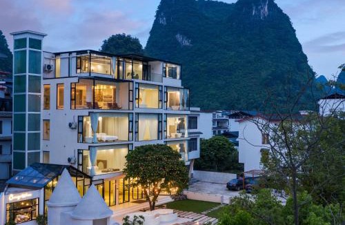 Yangshuo Hotel | Yangshuo OrangeWhite Resort - An Exclusive Cave - Inspired Haven by the River - Featuring Panoramic Mountain Views-Infinity Pool & Alpaca Encounters & Tailor-Made Excursions