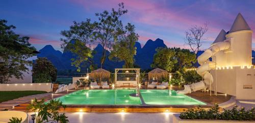 Yangshuo Hotel | Yangshuo OrangeWhite Resort - An Exclusive Cave - Inspired Haven by the River - Featuring Panoramic Mountain Views-Infinity Pool & Alpaca Encounters & Tailor-Made Excursions