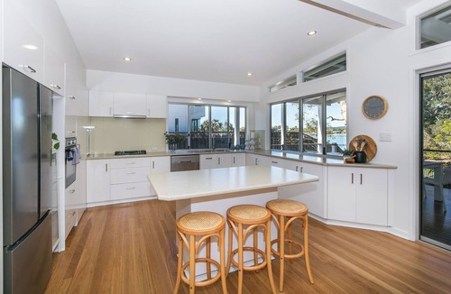 Burleigh Heads Apartment | Your luxury waterfront holiday awaits at this stunning 5-bed pet-friendly home.