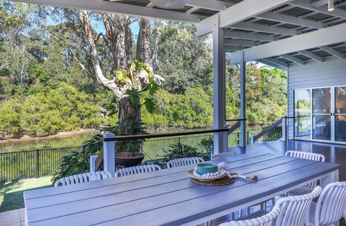 Burleigh Heads Apartment | Your luxury waterfront holiday awaits at this stunning 5-bed pet-friendly home.
