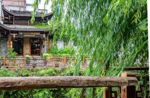 Wulingyuan Bed & Breakfast | Zhangjiajie Cloudscape Courtyard Hotel-Vegan Available, Chinese Retro Style,Tea Culture Experience, Free Breakfast ,Travel Guide& Book Tickets,Friendly Host,Orient esthetics