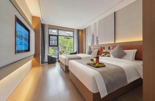 Wulingyuan Hotel | Zhangjiajie Gui Yuan Hotel - Free delivery to the East Gate once-service washing machine with drying, luggage storage-over 4 nights and get one free airport pick-up