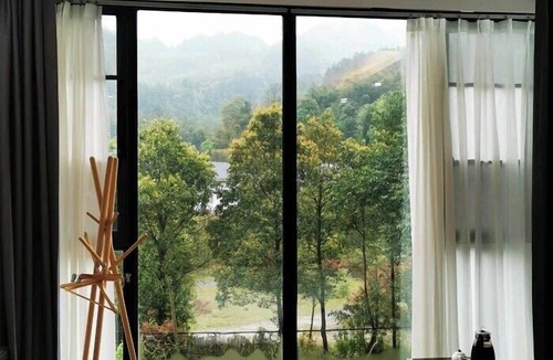 Chaqiyu Hotel | Zhangjiajie Southgate Flower Garden Lodge at the Park Entrance