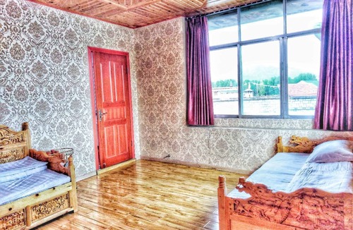 Daocheng House | Zishuo Zihua Guest House