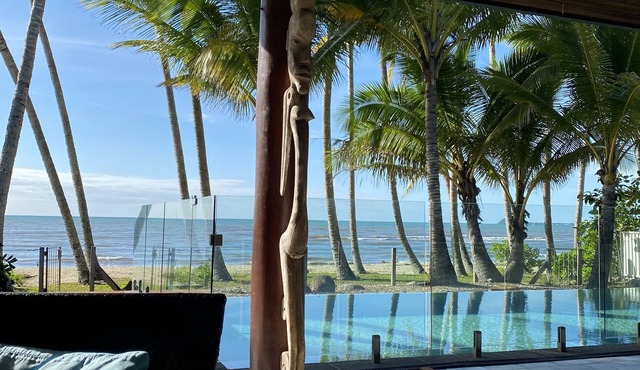 Absolute beachfront - private pool, reef and rainforest on your doorstep