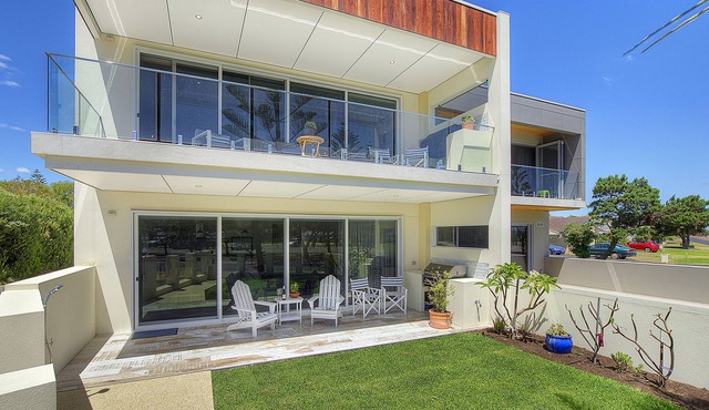 Beachside 880 beachfront luxury Apartment with Sunset views from the balcony.