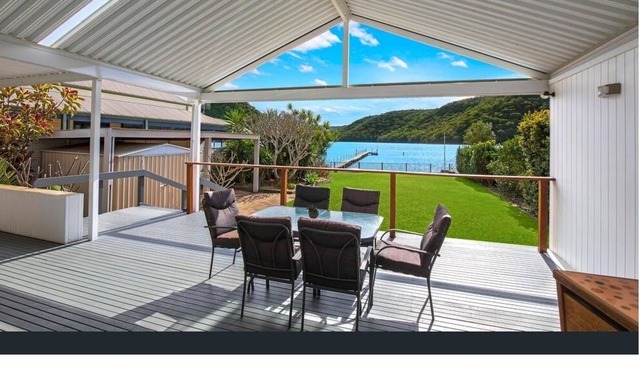 Central Coast Absolute Waterfront Cottage with Private Jetty