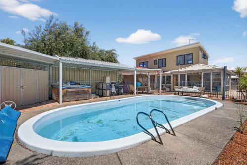 Coastal 2-Bed Home with Pool
