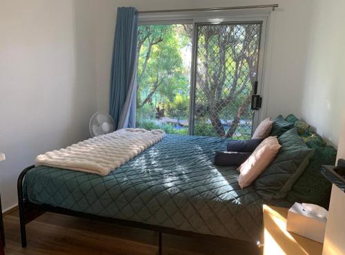 Fabulous Stunning Garden View King Bedroom with shared bathroom at MC 2079
