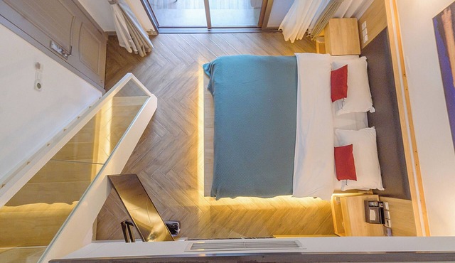 Heinemann Hotel loft suite with two king beds B306— with a jacuzzi and a local