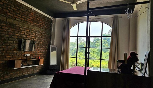 Industrial Studio with Forest Views