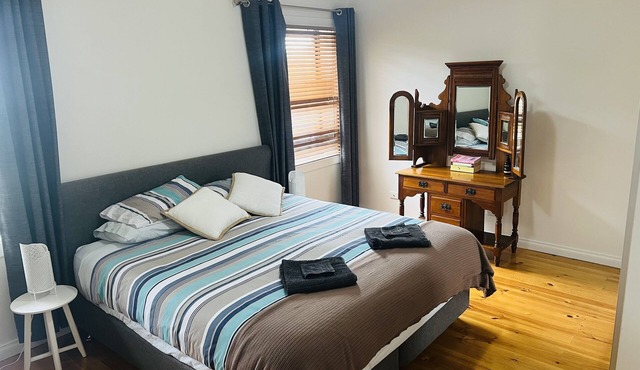 Light-filled comfortable 3 B/R 2 bathroom family home. Dogs by negotiation .