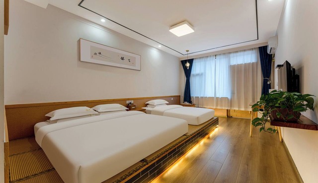 ManBuYunDuan.Theme Inn
