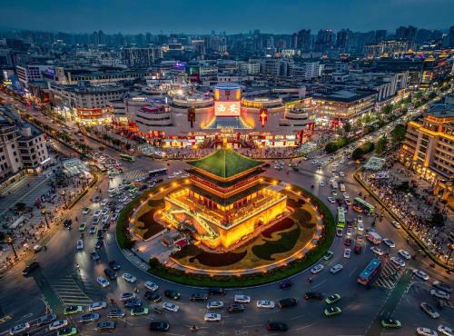 Mehood Hotel Ideally located in the heart of the city, just steps from the historic Xi'an Ancient Wall and Yuxiangmen Metro A short 3-stop ride to the Bell Tower