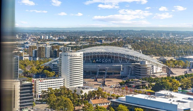 Modern 2BR Haven High Level & Stadium Views
