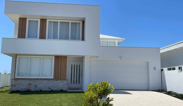 Modern Boho Retreat with Pool, Yard & Beaches Just Minutes Away