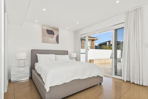 Modern Seafront Luxury, Steps from the Beach