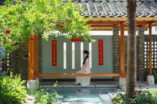 Music Village - Ancient Courtyard Resort with Garden Cafe - Designed by a South African architect - Golden Dragon Parade