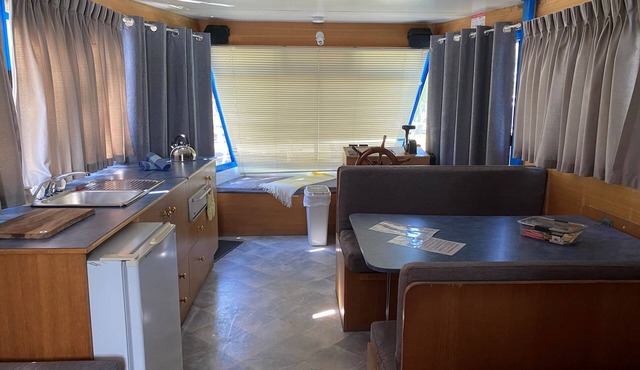 Riverside accommodation in tranquil setting