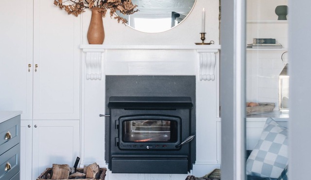 The Quarters: Stone Studio Retreat with Fireplace
