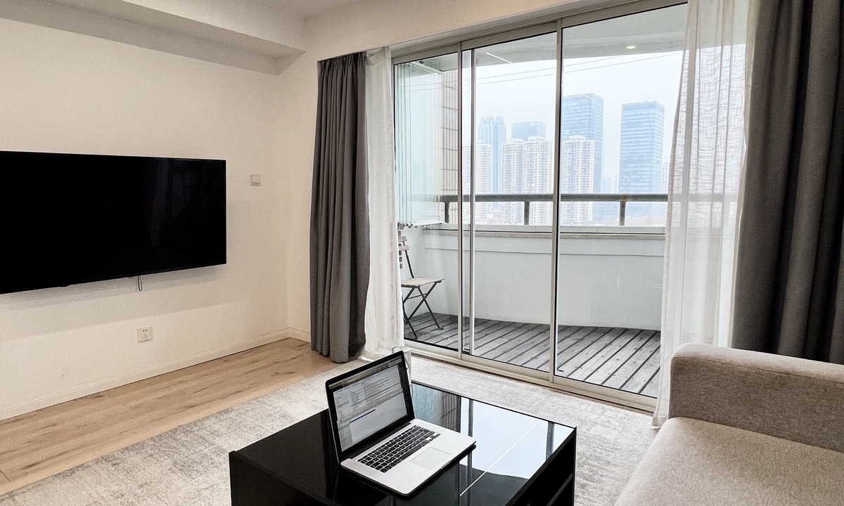 Huaihai Road Commercial Area Apartment | peaceful urban retreat in a stylish minimal apartment with views across the city