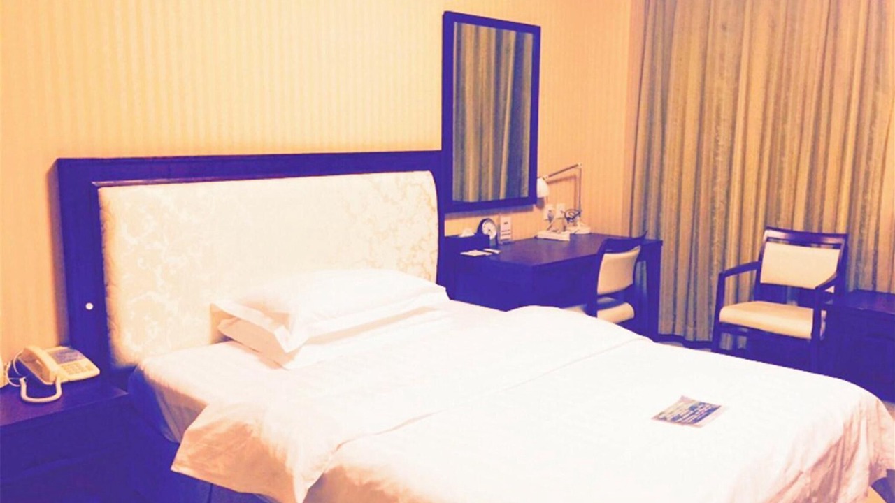 Photo of Bedroom in Dalian City Center