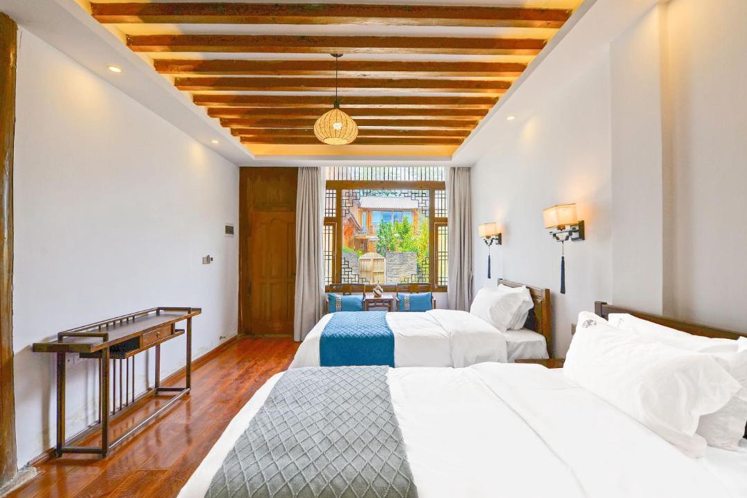 Photo of Bedroom in Baisha Old Town