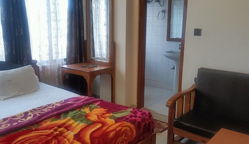 Deluxe Quadruple Room, City View