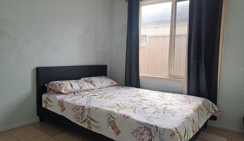 Queen Room with Shared Bathroom