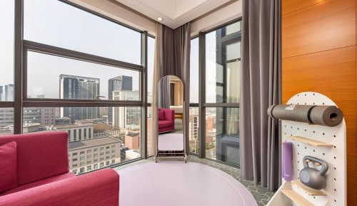 Standard King Room with Extra Floor Space and Exercise Equipment