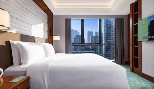 Two-Bedroom Suite with One King Bed, One Queen Bed and Kitchen