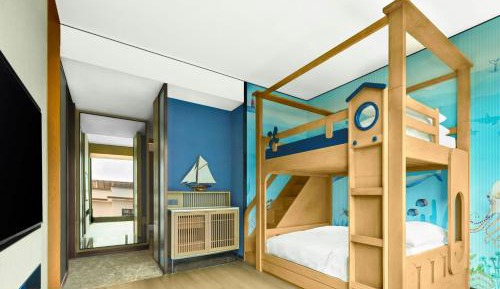 Family Suite with One King Bed and One Twin Bunk Bed