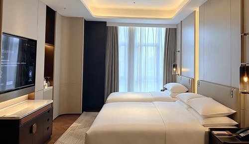 Deluxe Family Room with One King Bed and One Single Bed