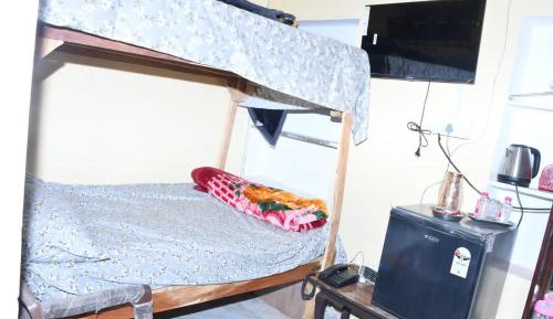 Single Bed in Dormitory Room