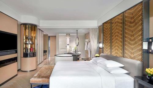 Luxury King Room with Club Access inclusive Mini Bar for the first round and 20% off F&B at hotel’s in-house restaurants