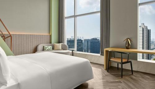 AC Family Suite with One King Bed and One Single Bed - City View