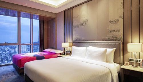 Premium Deluxe Family Room with One King and One Single Beds
