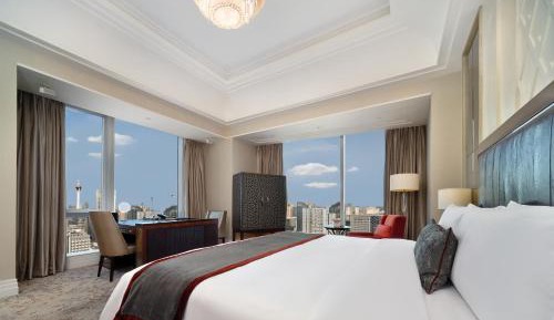 King Guest Room with One King Bed and Tower View