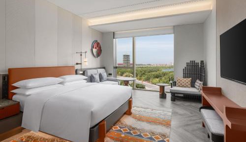 Deluxe Twin Room with Two Double Beds and Garden View