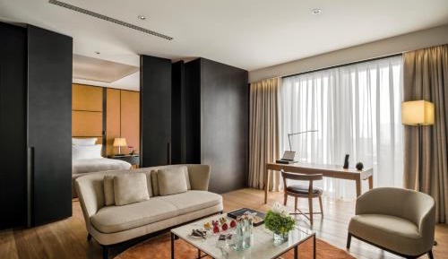 One-Bedroom Junior Suite with City View (Free Mini-bar soft drinks & beers + 1 free extra bed with 1 breakfast + 1.9 mi pick-up or drop-off service + Berluti shoe shinning & pressing service)