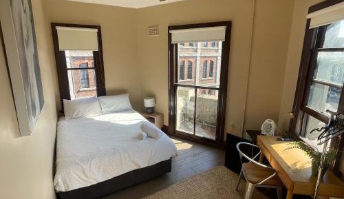 Queen Room with Shared Bathroom
