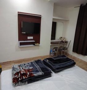 Deluxe Room (2 Adults + 1 Child)