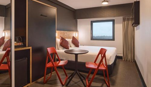 Standard Room with One King Bed and One Single Bed
