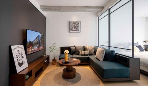 Exquisite One Bedroom Apartment (free coffee, washing machine, kitchen, specious living room, can add an extra bed and additional fee is CNY260 per day)