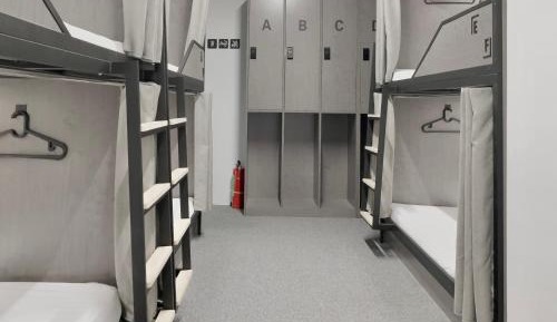 Bed in 6- Bed Male Dormitory Room