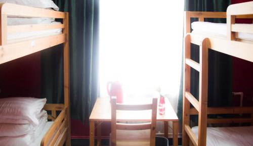 Bed in 4-Bed Female Dormitory Room with Shared Bathroom